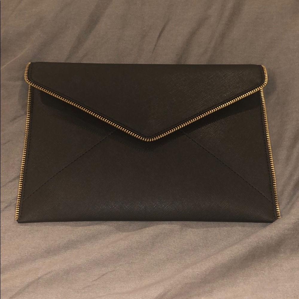 Rebecca Minkoff black Leo Clutch NWT. NEVER WORN